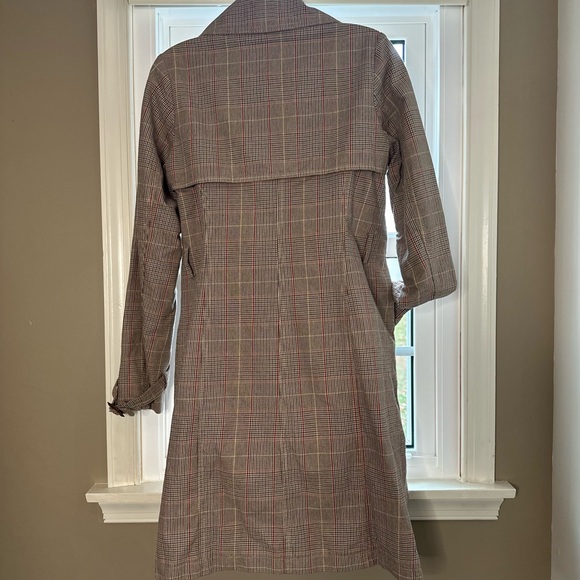 Trench coat. Brown w/white, orange/red, & yellow plaid pattern. Fully lined. - Picture 2 of 8